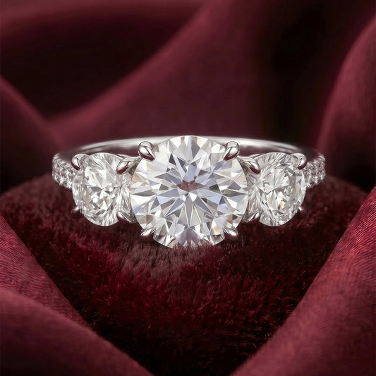 Gold band ring with a central diamond solitaire from Tresor Diamond's The Clara Ring collection.
