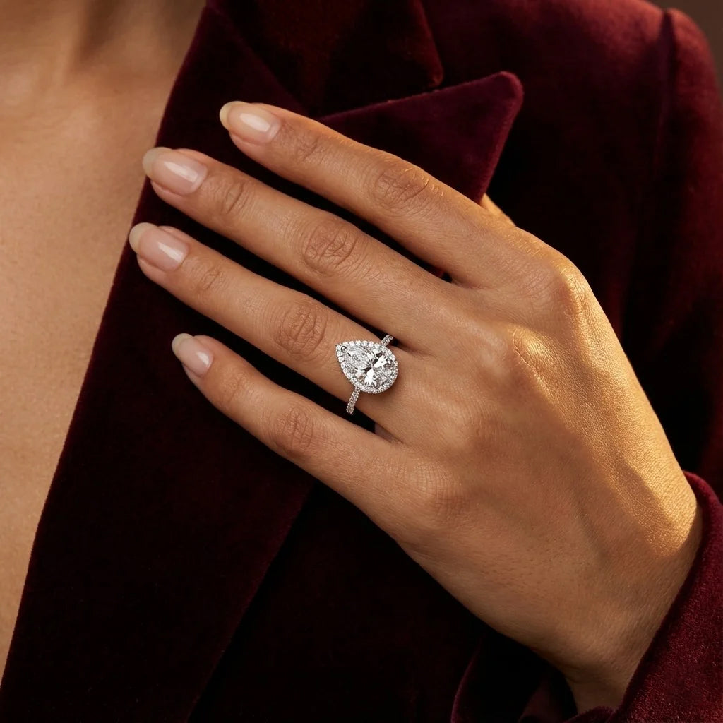 Close-up of the Tresor Diamond The Ada Ring, showcasing its elegant design and sparkling diamond details on a neutral background.