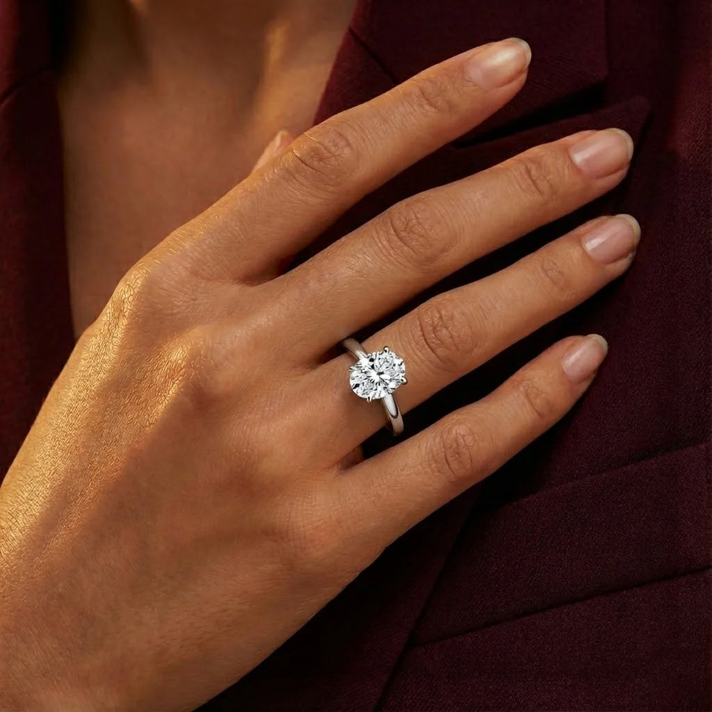 Tresor Diamond Alouette Ring showcasing a sleek band with elegant gemstone accents and intricate design details.