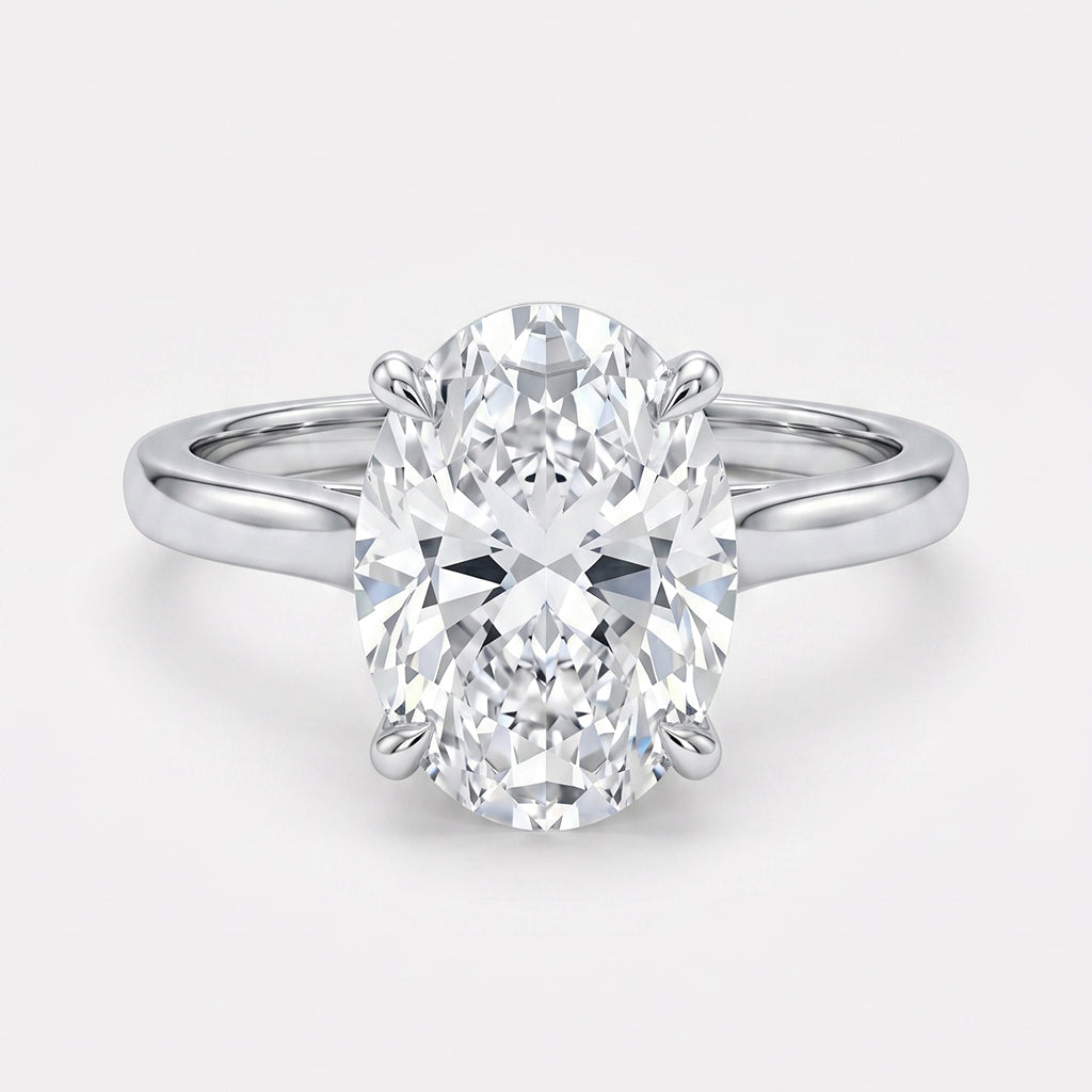 Tresor Diamond The Alouette Ring featuring a sleek silver band and a sparkling central gemstone, showcasing elegant jewelry design.