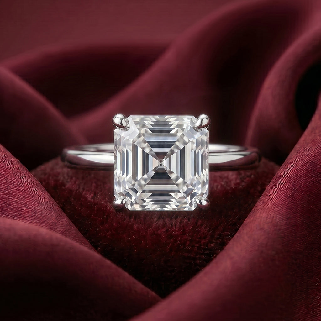 Elegant Tresor Diamond The Amaya Ring featuring sparkling diamonds and a sleek gold band, showcased on a white background.