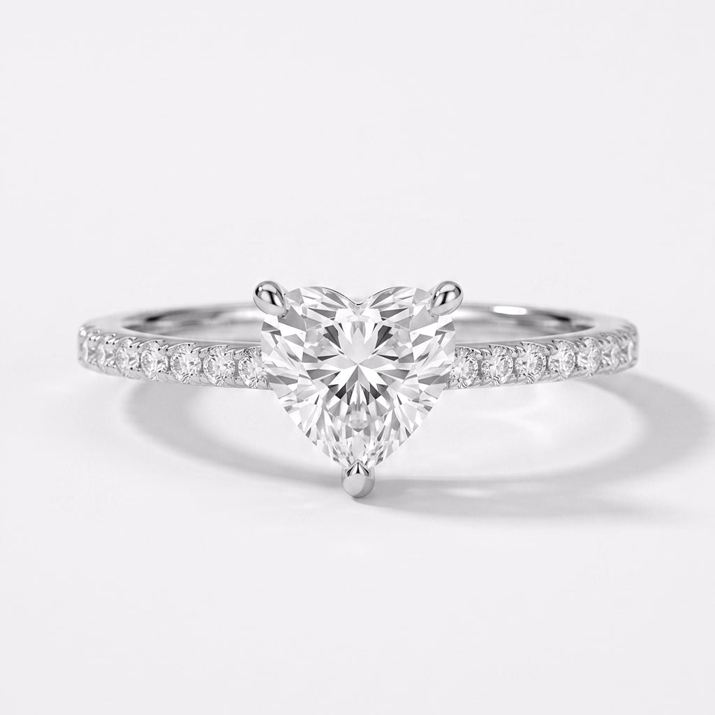 Close-up of Tresor Diamond's The Amoria Ring featuring intricate design and sparkling gemstones in a luxurious gold setting.