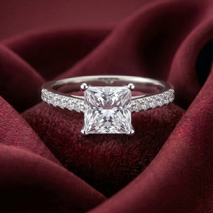 Close-up of Tresor Diamond's The Arlette Ring featuring intricate gold band and sparkling diamond accents.