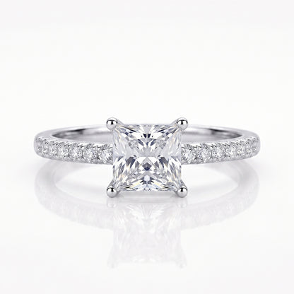 Close-up of Tresor Diamond's Arlette Ring featuring a delicate band with sparkling gemstone accents.