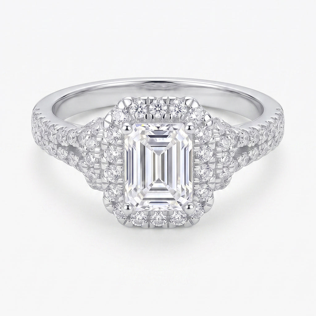 Elegant gold Aurelia ring by Tresor Diamond featuring a sparkling central gemstone and intricate band design.