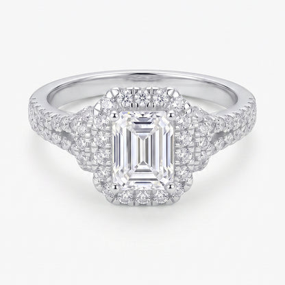 Elegant gold Aurelia ring by Tresor Diamond featuring a sparkling central gemstone and intricate band design.