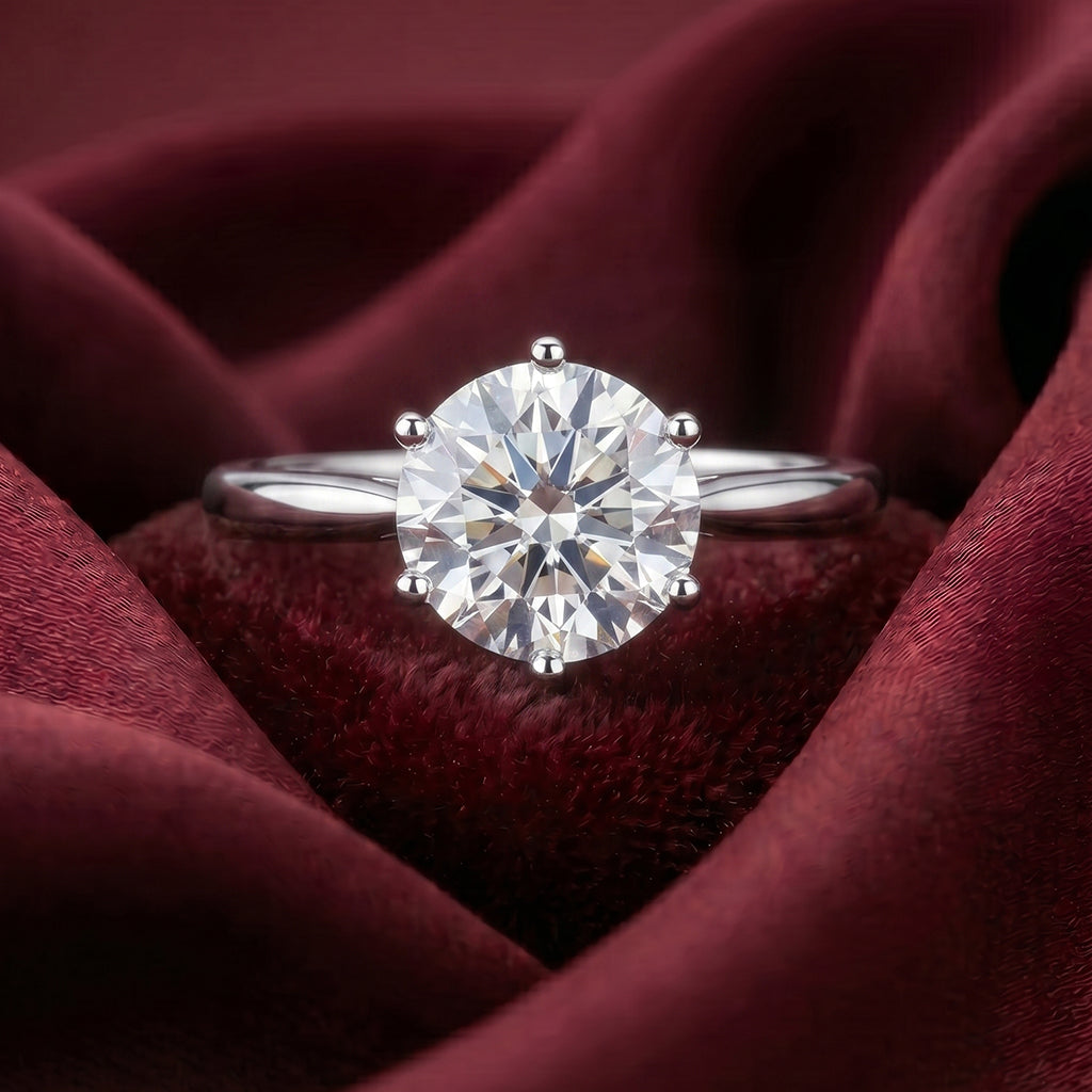 Elegant close-up of Tresor Diamond's The Celina Ring featuring a sparkling diamond band on a white background.