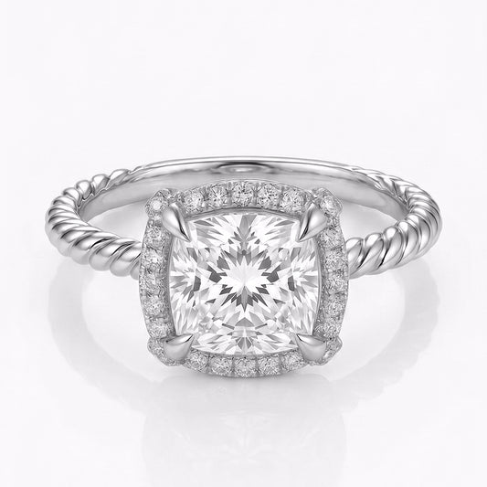 Tresor Diamond The Celine Ring featuring a sleek band with a sparkling diamond accent on a white background.