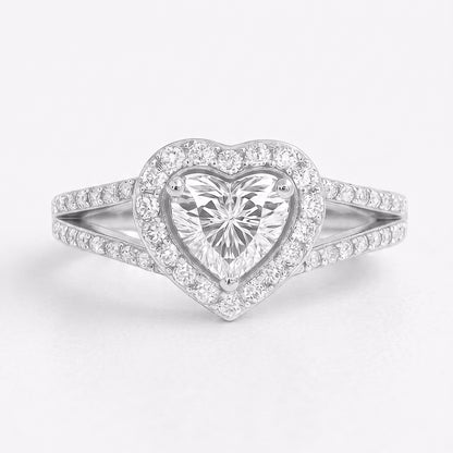 Gold Tresor Diamond The Corinne Ring featuring a sleek band with a sparkling central gemstone and elegant design.