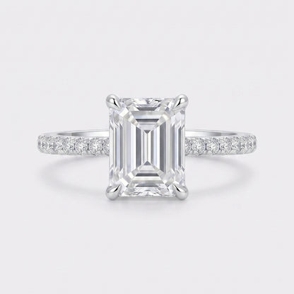 The Lenora Ring by Tresor Diamond featuring a delicate band with a sparkling central diamond and intricate metalwork.