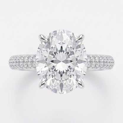 Close-up of Tresor Diamond's The Lily Ring featuring a delicate band with a central gemstone and intricate design details.