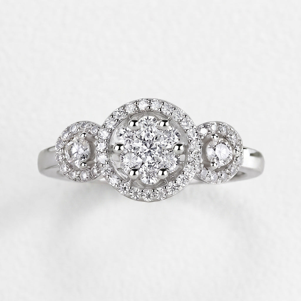 Shiny gold Nora Ring by Tresor Diamond featuring a sleek band and a central diamond gemstone.