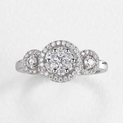 Shiny gold Nora Ring by Tresor Diamond featuring a sleek band and a central diamond gemstone.