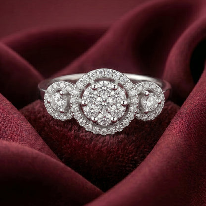 Close-up of Tresor Diamond The Nora Ring featuring a sleek gold band and a sparkling diamond centerpiece.