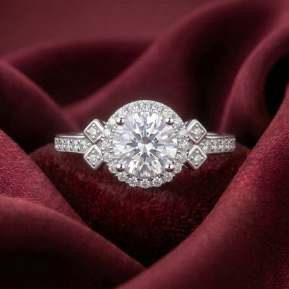 Elegant gold Odessa Ring by Tresor Diamond featuring a sparkling central diamond and intricate band design.