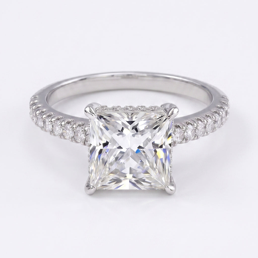 Close-up of Tresor Diamond's The Vionara Ring showcasing intricate design and sparkling gemstone on a white background.