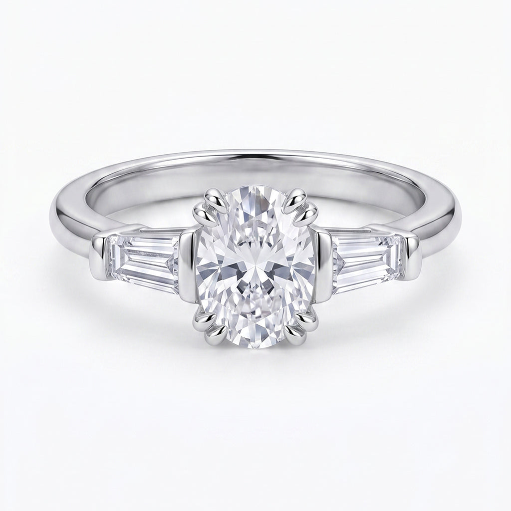 Silver Tresor Diamond The Vivienne Ring featuring a sleek band and sparkling gemstone accent on a white background.
