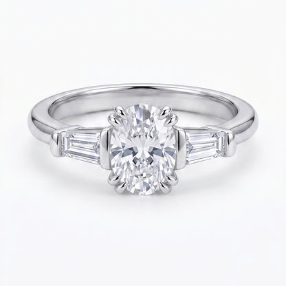 Silver Tresor Diamond The Vivienne Ring featuring a sleek band and sparkling gemstone accent on a white background.