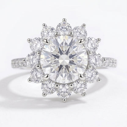 Gold Tele Ring by Tresor Diamond featuring a sleek band and a prominent central gemstone.
