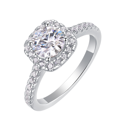 Elegant Tresor Diamond True Ring with a sparkling diamond setting and polished band, displayed on a soft fabric background.